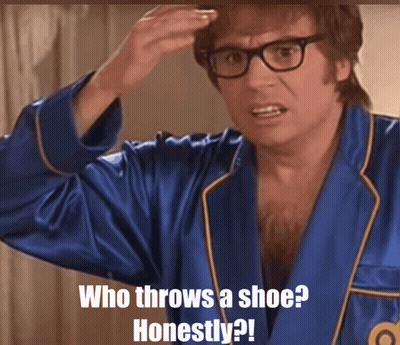 Man In Blue Robe Says Who Throws A Shoe Honestly GIF