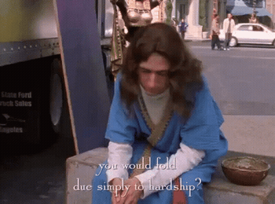 Man In Blue Robe With Text You Would Fold Due Simply To Hardship GIF