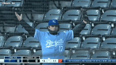 Man In Blue Royals Jersey In Stands GIF