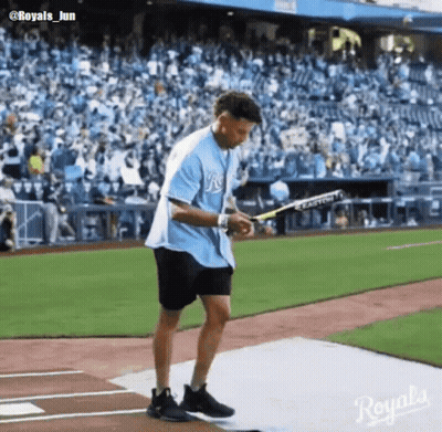 Man In Blue Royals Shirt Holding Bat GIF