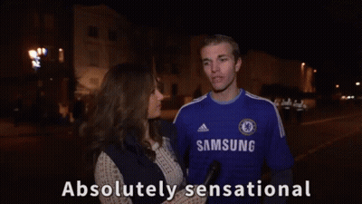 Man In Blue Samsung Shirt Talking To Woman GIF
