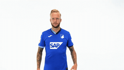 Man In Blue Sap Shirt Holding Head GIF