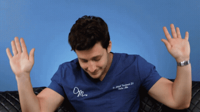 Man In Blue Scrub Top Saying Dr. Ariel Weinberg D.D GIF