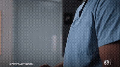 Man In Blue Scrub Using Cell Phone #NewAmsterdam GIF