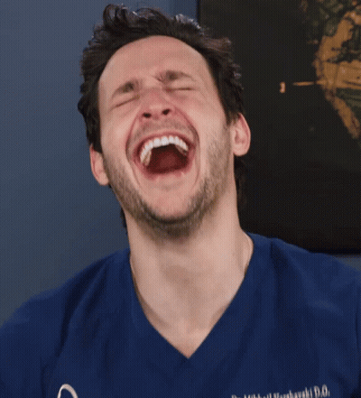 Man In Blue Scrubs Laughing GIF