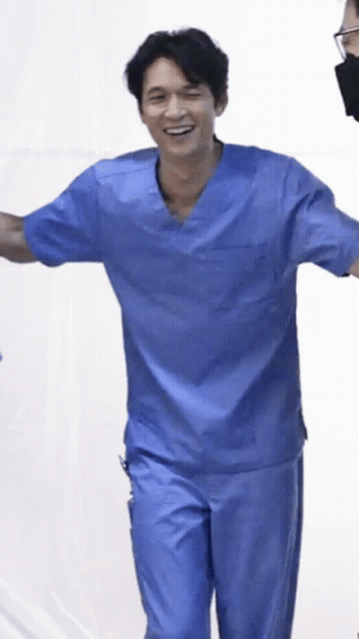 Man In Blue Scrubs Smiling GIF