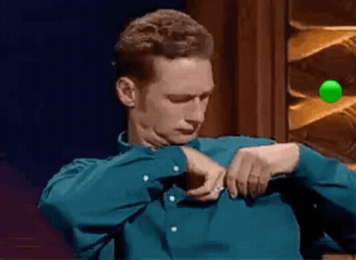 Man In Blue Shirt Adjusting Sleeves GIF