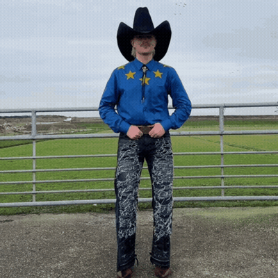 Man In Blue Shirt And Black Cowboy Hat GIF