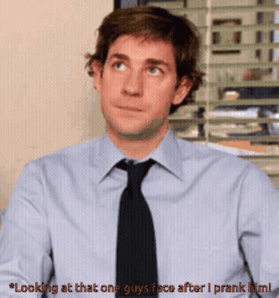 Man In Blue Shirt And Black Tie Saying Looking At That One Guy's Face After I Prank Him GIF