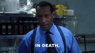 Man In Blue Shirt And Black Tie Says In Death GIF