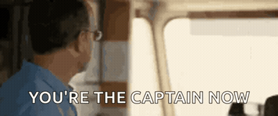 Man In Blue Shirt And Glasses Says You're The Captain Now GIF