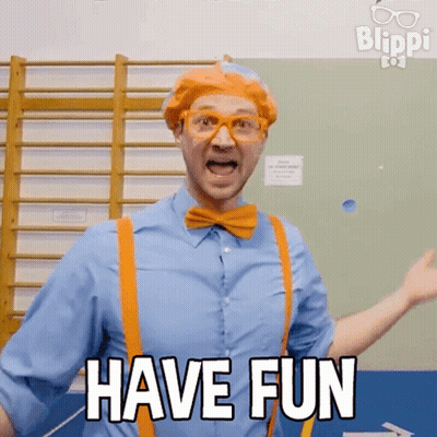 Man In Blue Shirt And Orange Suspenders Saying Have Fun GIF