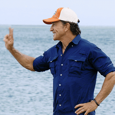 Man In Blue Shirt And Orange White Hat Thumbs Up GIF