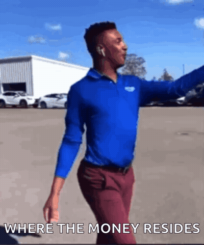 Man In Blue Shirt And Red Pants Dancing Where The Money Resides GIF