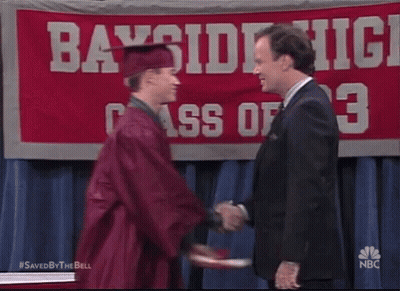 Man In Blue Shirt And Red Tank Top Beside Suited Man GIF