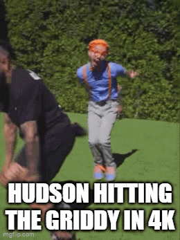 Man In Blue Shirt And Suspenders Jumping GIF