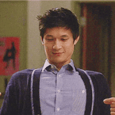 Man In Blue Shirt And Suspenders Smiling GIF