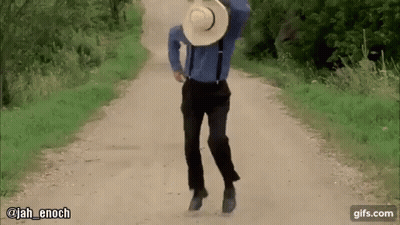 Man In Blue Shirt And Suspenders Walking GIF