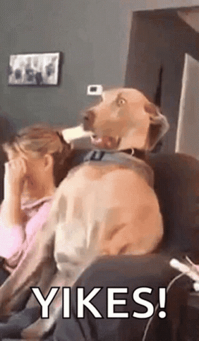 Man In Blue Shirt And Tie Before Bulletin Board GIF