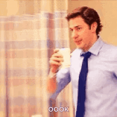 Man In Blue Shirt And Tie Drinking GIF