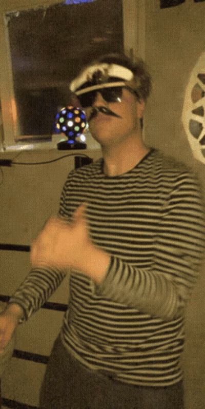 Man In Blue Shirt And Tie Eating Bagel Netflix Logo GIF