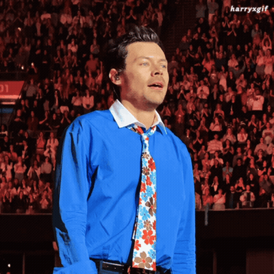 Man In Blue Shirt And Tie In Front Of Crowd #HarryxGif