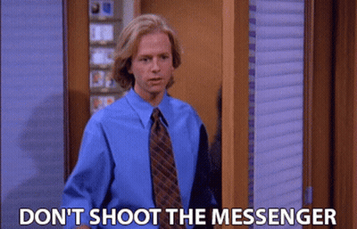 Man In Blue Shirt And Tie Saying Don't Shoot The Messenger GIF