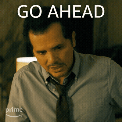 Man In Blue Shirt And Tie Saying Go Ahead GIF
