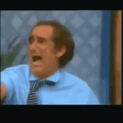 Man In Blue Shirt And Tie Screaming GIF