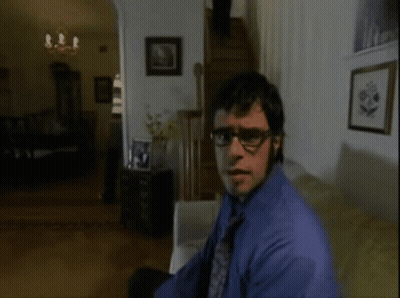 Man In Blue Shirt And Tie Sings It's Business GIF