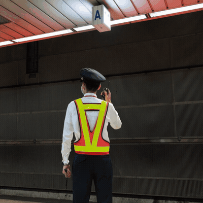 Man In Blue Shirt And Tie With KB Patch GIF