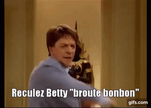 Man In Blue Shirt And Tie With Reculez Betty GIF
