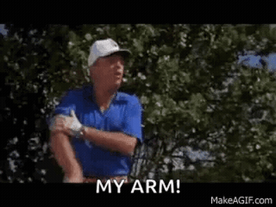 Man In Blue Shirt And White Hat On Golf Course GIF