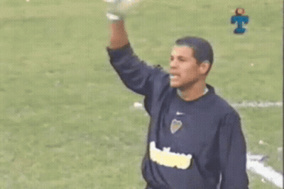 Man In Blue Shirt Arm Up Soccer Field GIF