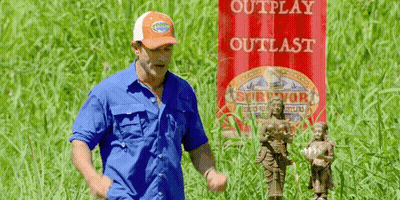 Man In Blue Shirt At Red Outplay Outlast Sign GIF
