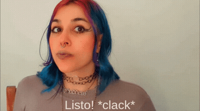 Man In Blue Shirt Before Crowd In Dark Room GIF