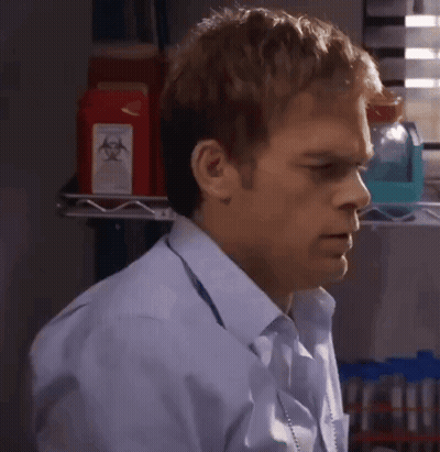 Man In Blue Shirt By Biohazard Sign GIF