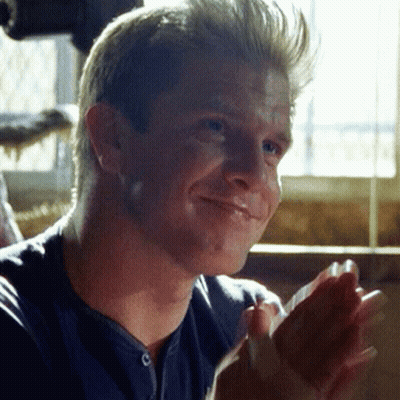 Man In Blue Shirt Clapping And Smiling GIF