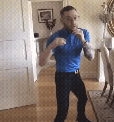 Man In Blue Shirt Dancing GIF
