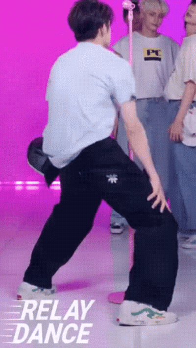 Man In Blue Shirt Dancing In Front Of Crowd GIF
