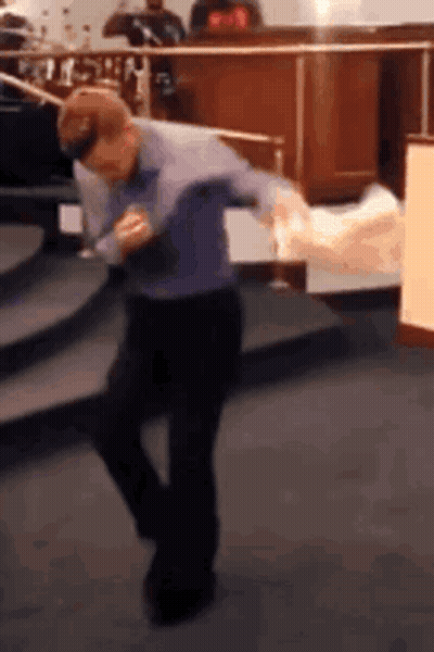 Man In Blue Shirt Dancing On Stage GIF