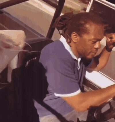 Man In Blue Shirt Driving Car GIF
