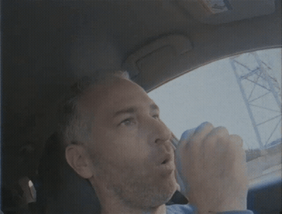 Man In Blue Shirt Driving Car Eyes Closed GIF