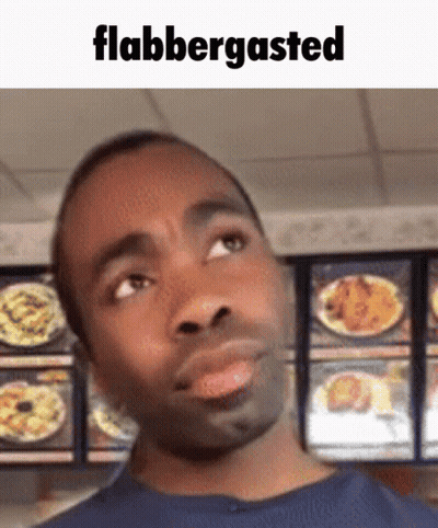 Man In Blue Shirt Flabbergasted GIF