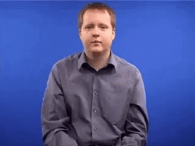 Man In Blue Shirt Gesturing GIF