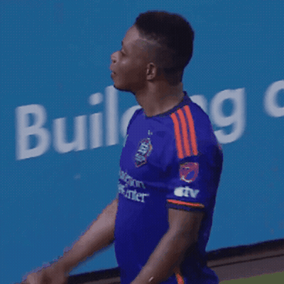Man In Blue Shirt Giving Middle Finger GIF
