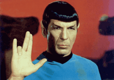 Man In Blue Shirt Giving Peace Sign GIF