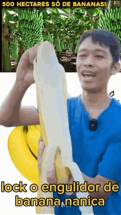 Man In Blue Shirt Holding Banana GIF