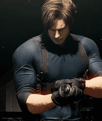 Man In Blue Shirt Holding Gun GIF