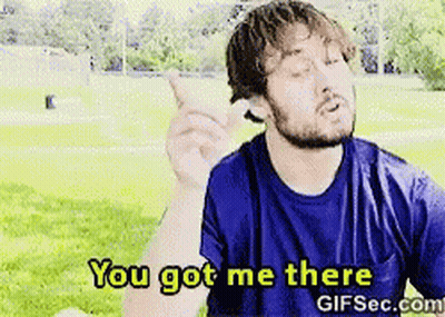 Man in Blue Shirt Holding Ice Cream Saying You Got Me There